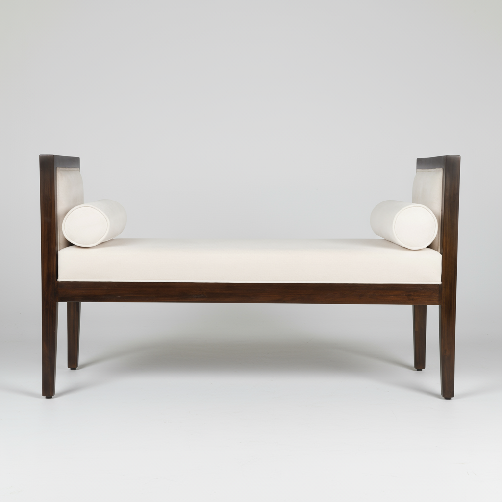 Wooden bench with white cushion on a white background