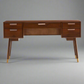 Wooden desk with multiple drawers on a white background