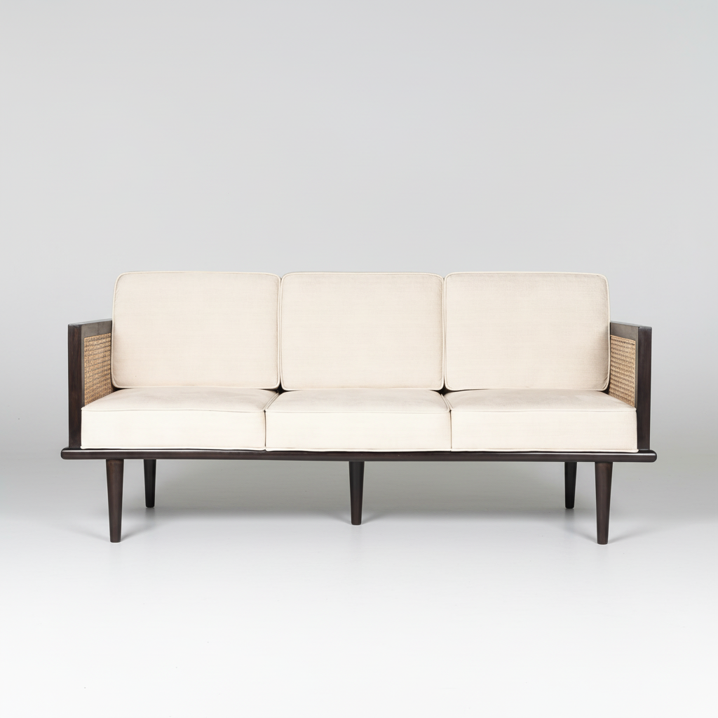 Bruce mid-century modern teakwood three seater sofa with cane side panels and upholstered seat and back cushions – front view