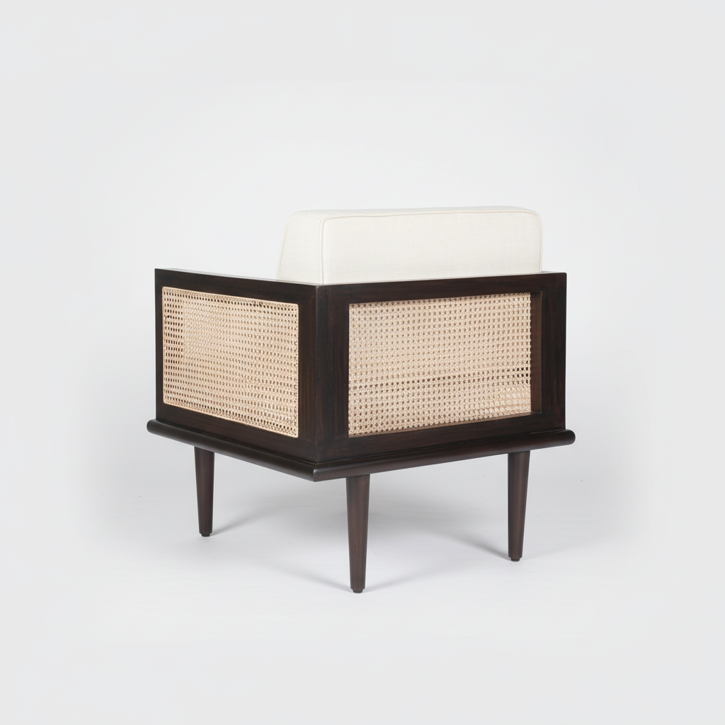 Bruce mid-century modern teakwood single seater sofa with cane side panels and upholstered seat and back cushions – back iso view