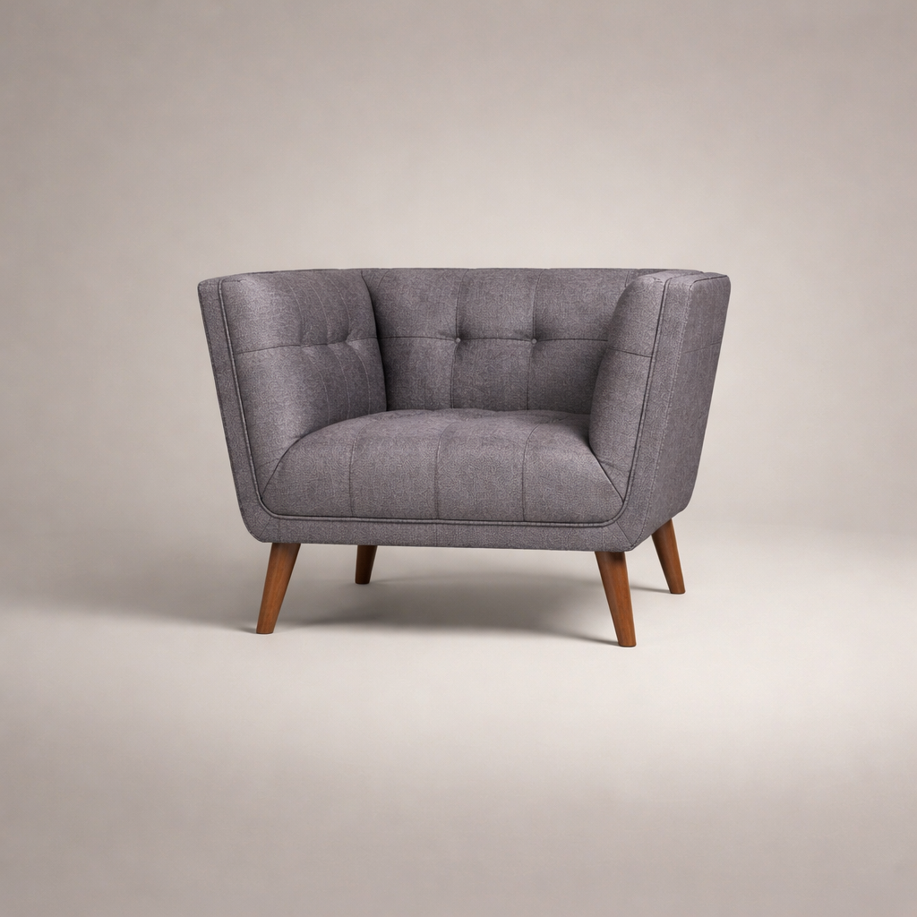 Gray armchair with wooden legs on a beige background
