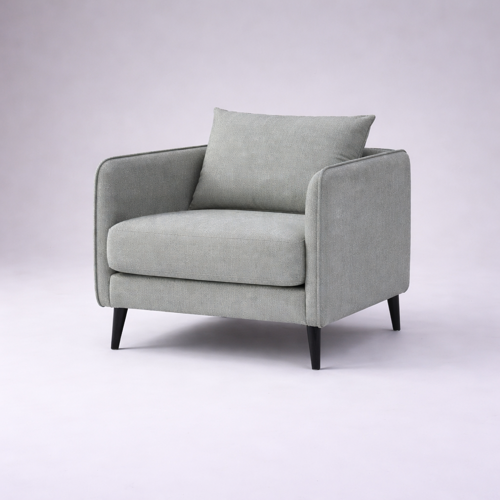 Falcon modern fabric single seater sofa with solid teakwood base and clean contemporary lines – isometric view