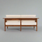 Hibiki Japanese minimalist teakwood sofa with upholstered seat and back cushions and signature side leather panel detail – back view