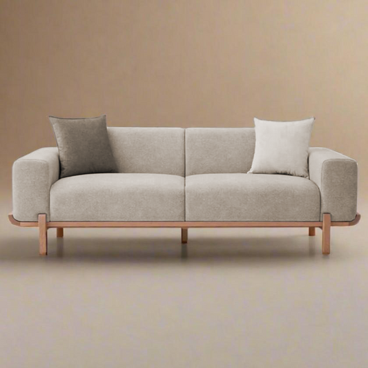 Ikoi modern wooden base sofa in neutral fabric with rounded armrests and solid teakwood frame – front view