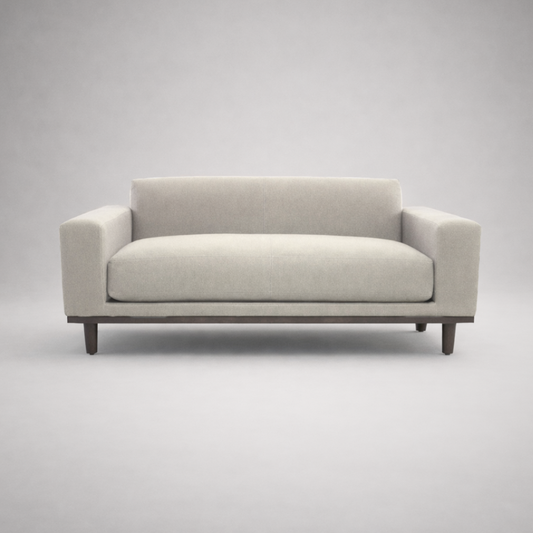 Irene modern upholstered fabric sofa front view with solid wood base in neutral finish