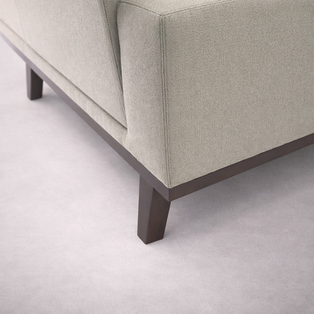Irene sofa upholstery detail with tailored stitching and premium fabric texture