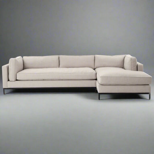 Lira modern sectional sofa with chaise in neutral fabric upholstery and slim metal base for contemporary living rooms – right aligned chaise front view
