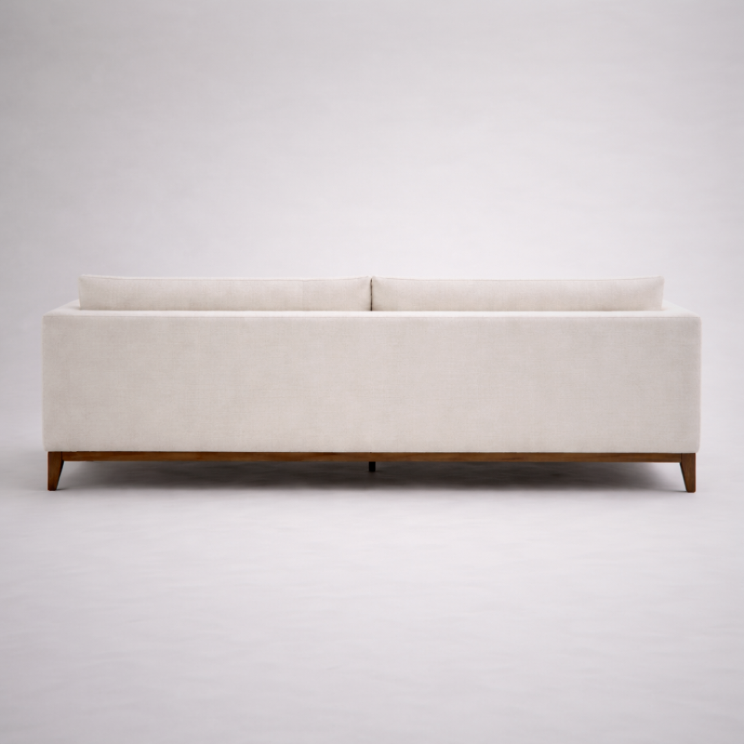 Noma modern minimalist fabric sofa with solid teakwood base and clean linear form for contemporary living rooms back view