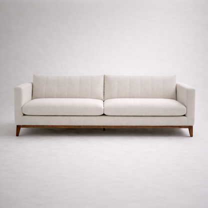 Noma modern minimalist fabric sofa with solid teakwood base and clean linear form for contemporary living rooms front view