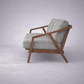 Paula S 3 seater modern teakwood frame sofa with upholstered cushions – side view