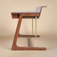 Wooden desk with a white surface on a white background