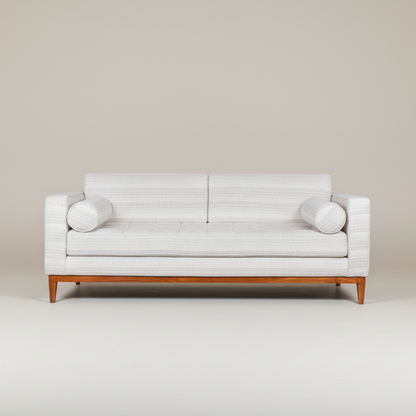 Roan F modern teakwood three seater sofa in textured neutral fabric with bolster cushions and solid wood base for contemporary living rooms – front view