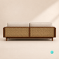 Trame mid-century modern sofa featuring a teakwood frame, woven rattan side panels, and cream fabric upholstery