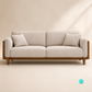 Trame mid-century modern sofa featuring a teakwood frame, woven rattan side panels, and cream fabric upholstery