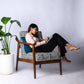 Juno wooden lounge chair handcrafted in teakwood by Bluedot Design – lifestyle view